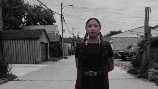 Image of student in traditional First Nations dress